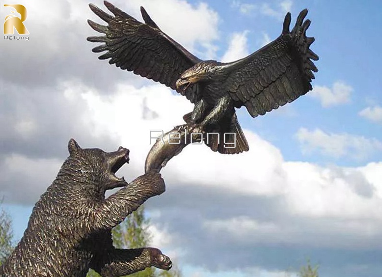 details of bronze bear and eagle statue