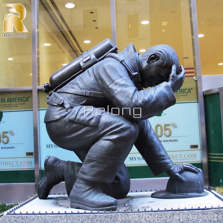 kneeling firefighter statue