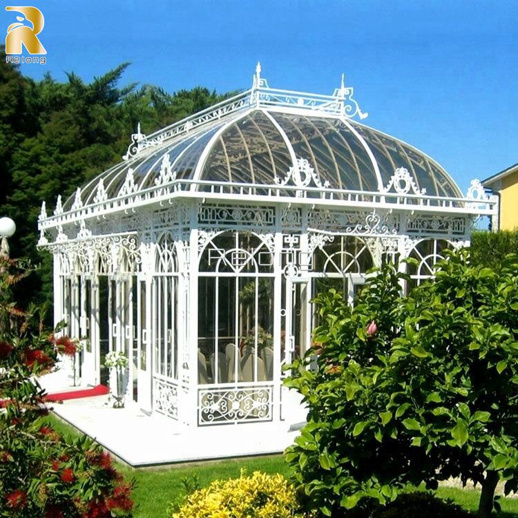 white wrought iron greenhouse