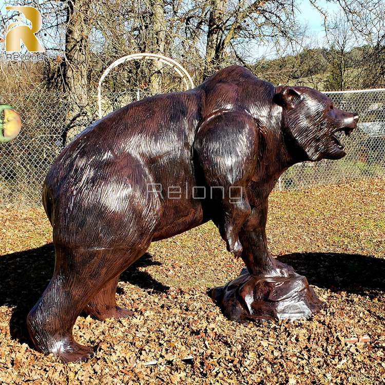 metal-bear-on-rock-statue-roaring-side