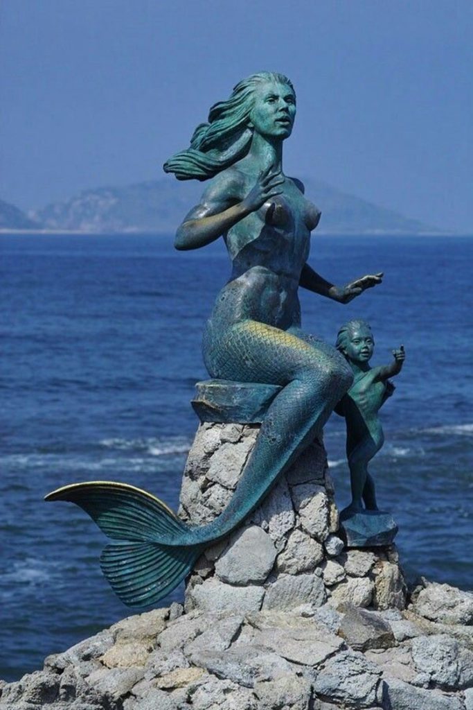 antique bronze mermaid sculpture