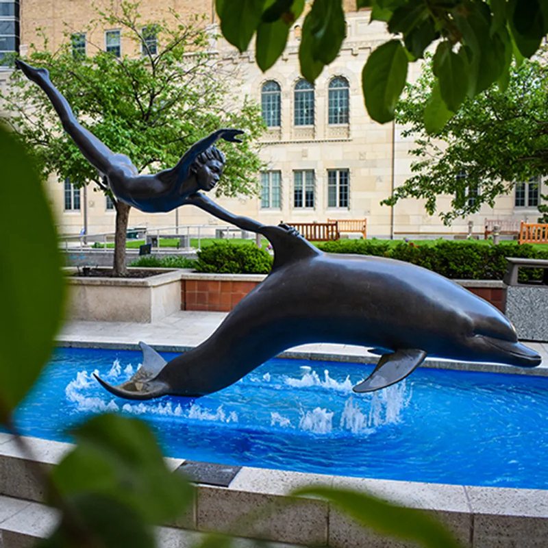 boy with a dolphin-for pool decor