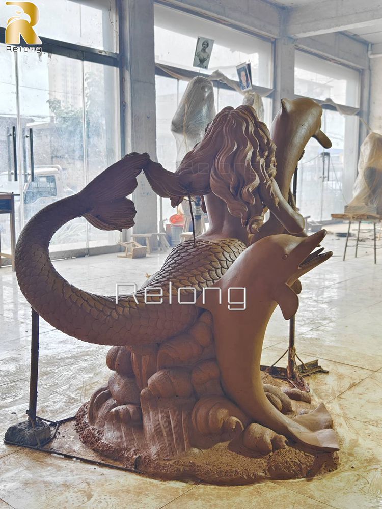 clay maodel of the bronze mermaid statue]