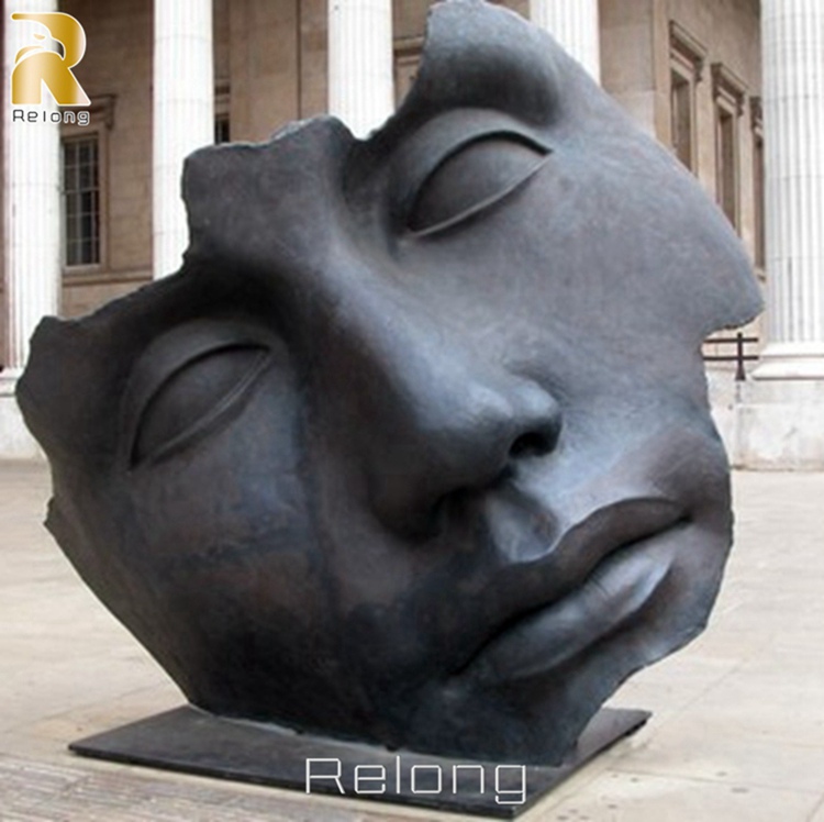 outdoor large bronze face sculpture