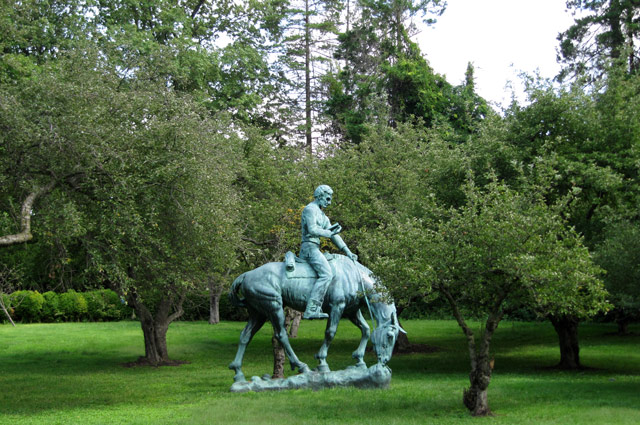 bronze horse and man sculpture