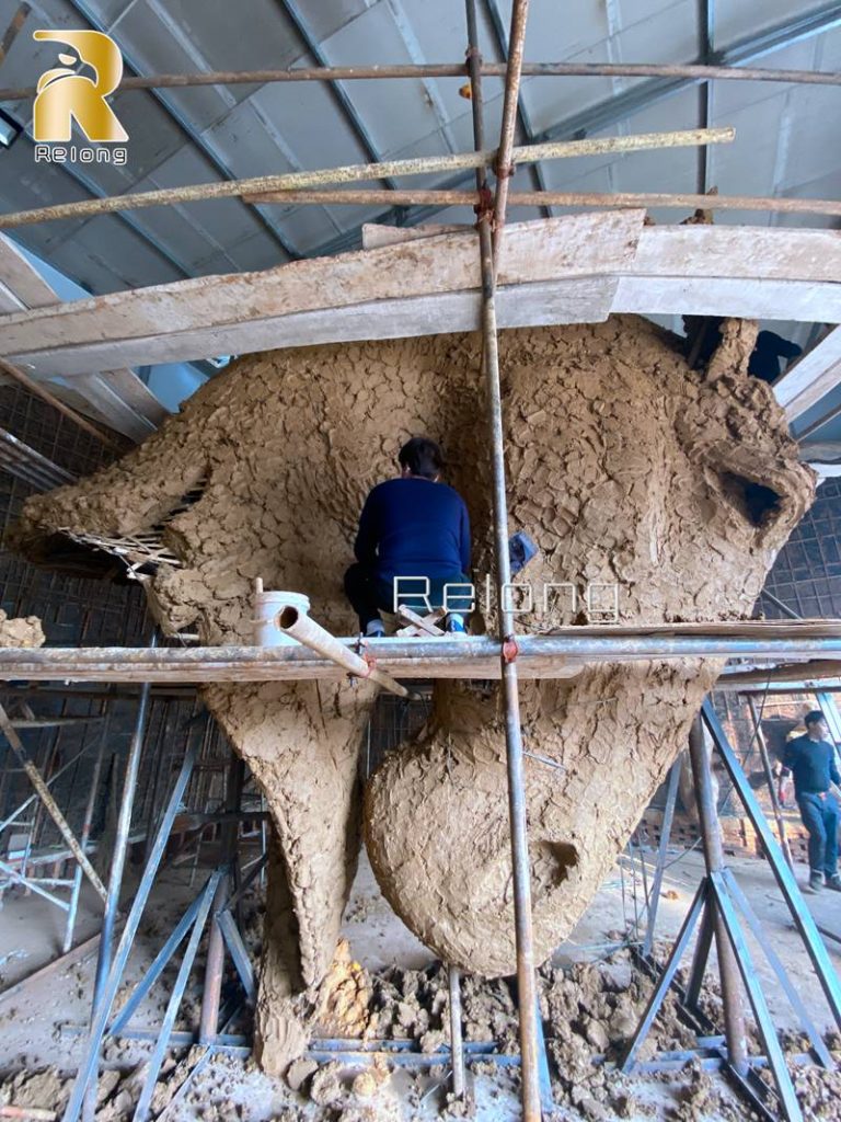 large clay model of bronze horse head sculpture