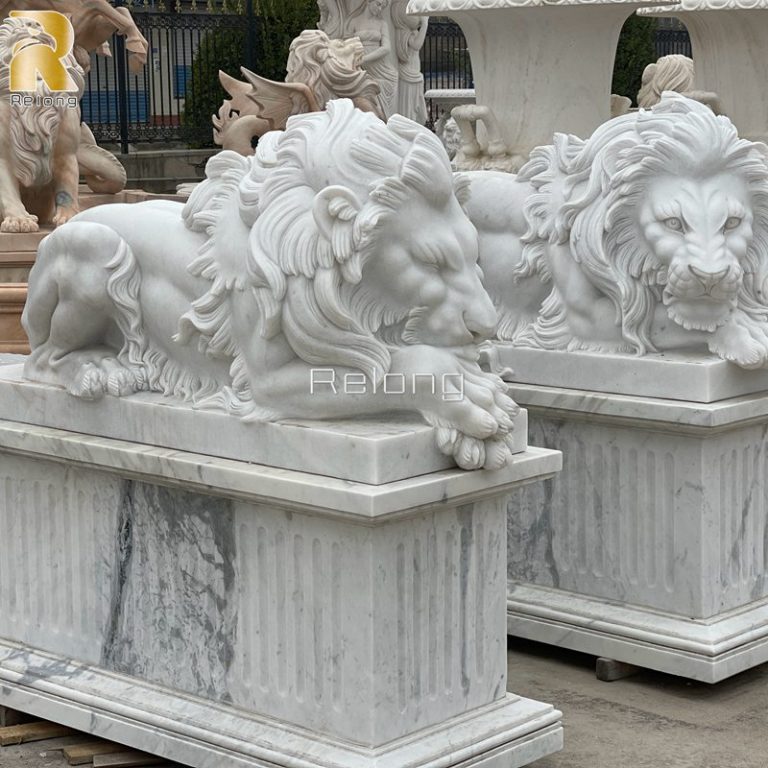 restful lion carved in marble