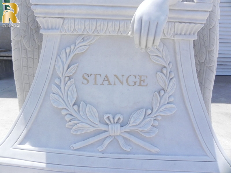 support lettering on tombstone