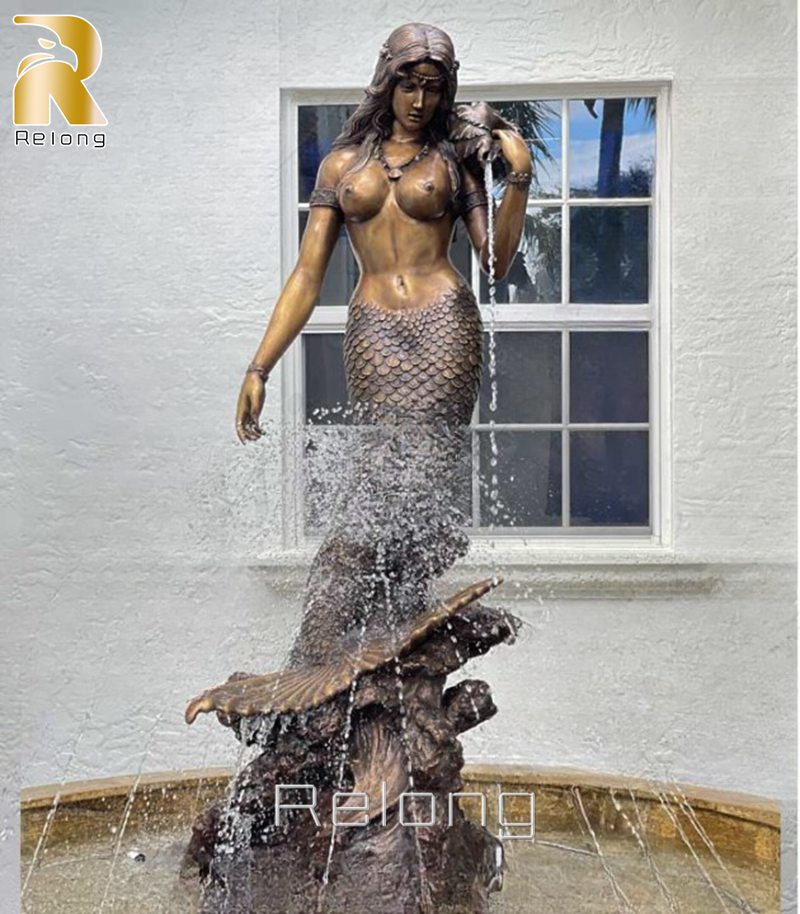 beauiful bronze mermaid fountain