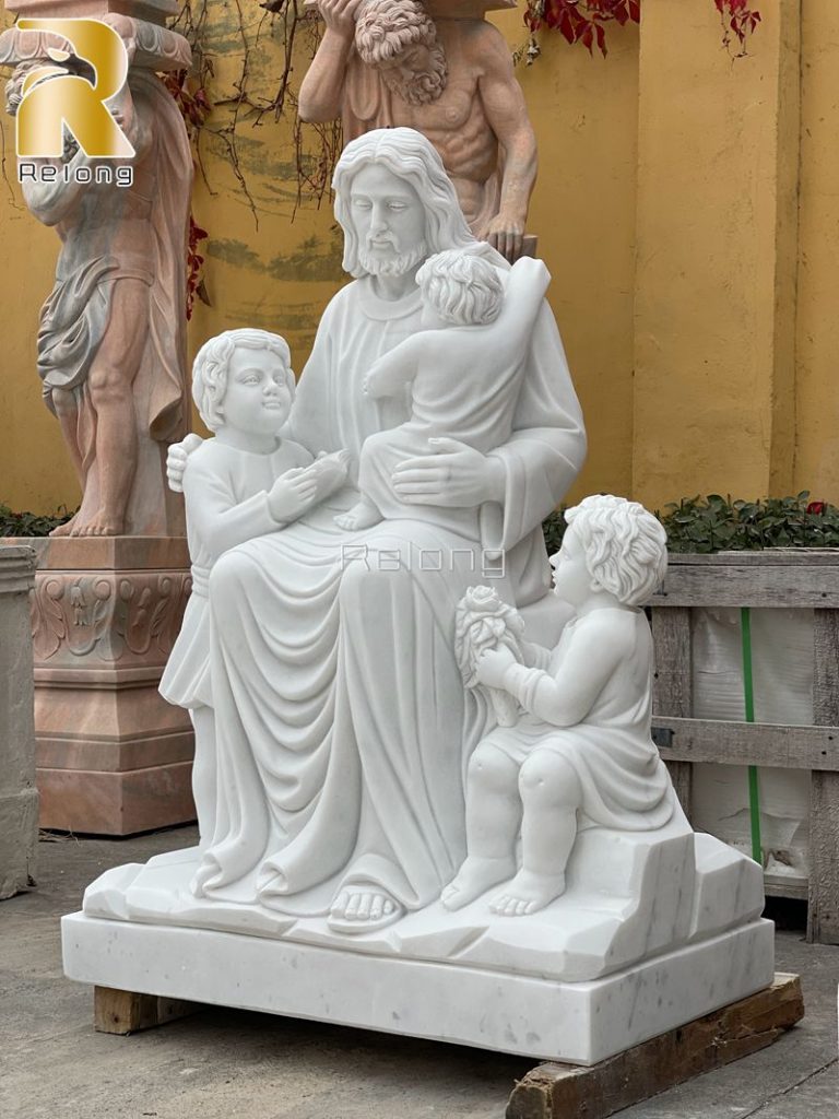 marble statue of Jesus with children