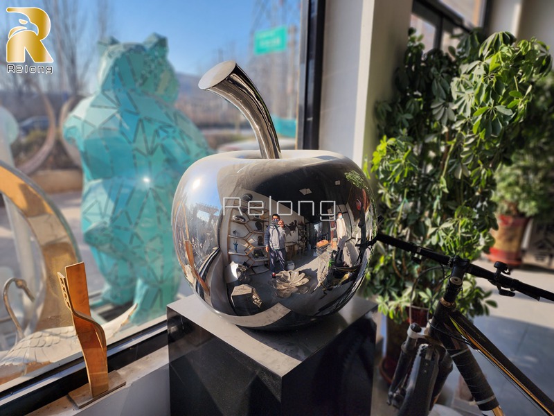 mirror polished stainless steel apple sculpture