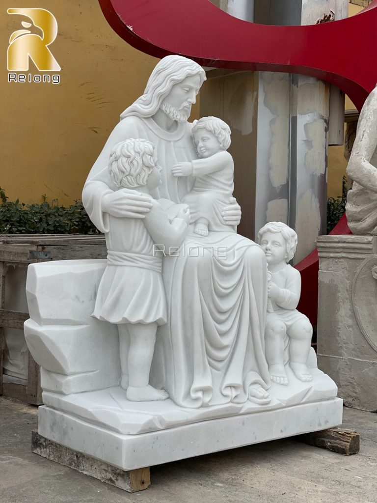 outdoor statue of Jesus with children