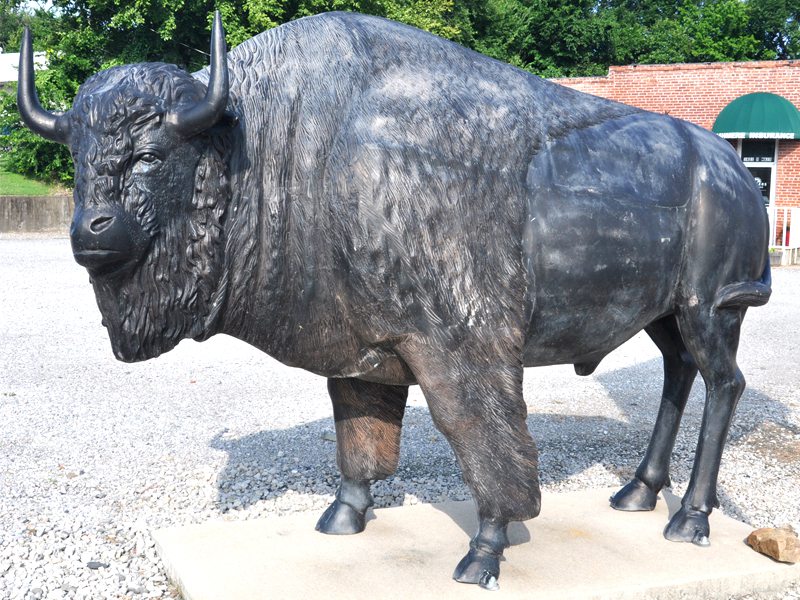 cast metal buffalo statue