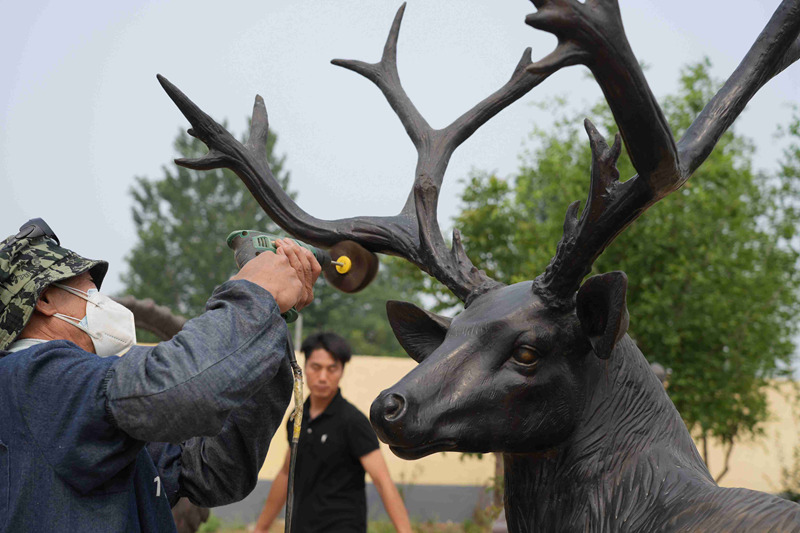 cleaning outdoor bronze sculptures