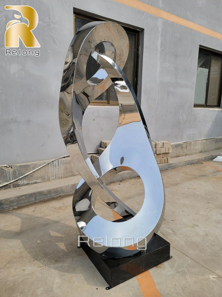 highly polished stainless steel abstract statue