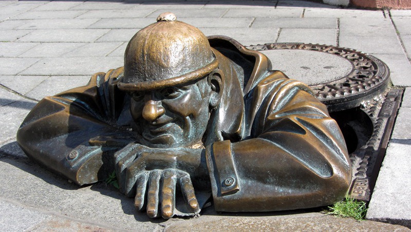 public street Cumil Statue in Bratislava, Slovakia