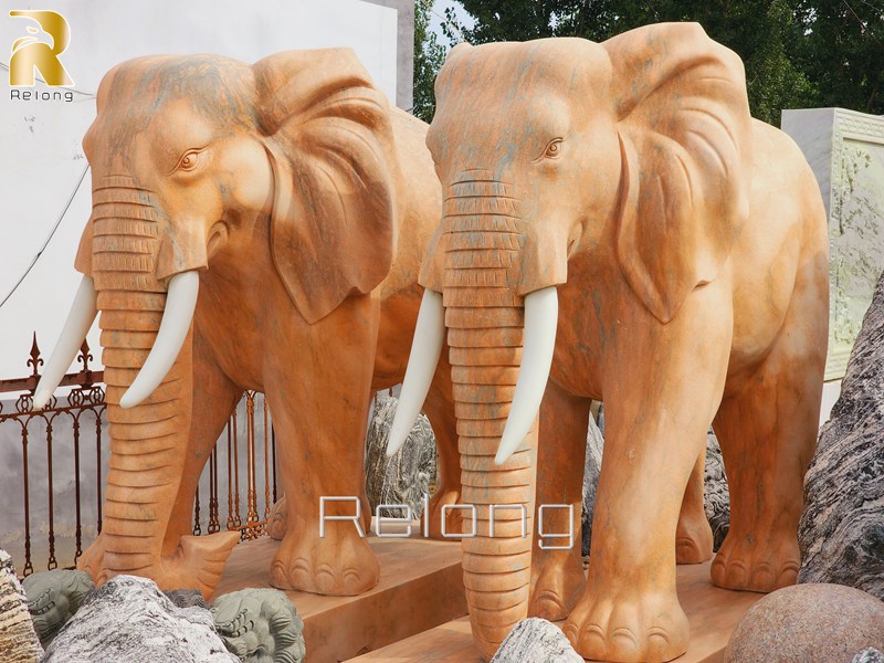 sunset red marble elephant sculpture