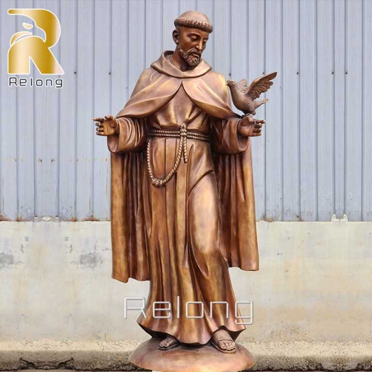 outdoor St. Francis statue with birds