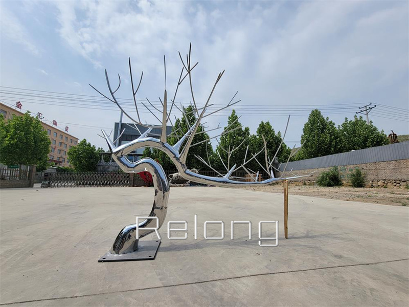 polished outdoor metal tree sculpture