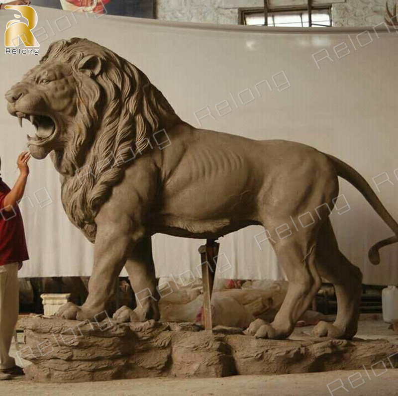 clay model of bronze lion statue