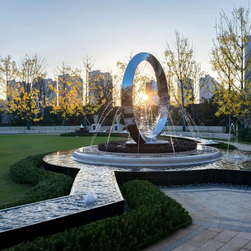 modern circular metal garden fountain