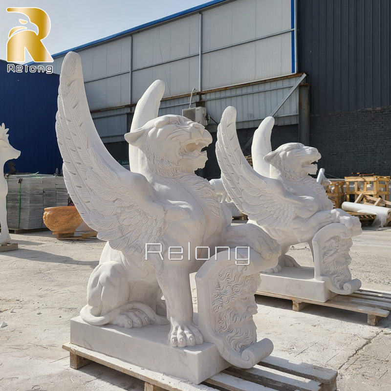 hand carved life size winged lion statue