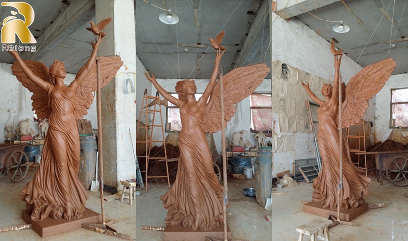 clay model of angel sculpture