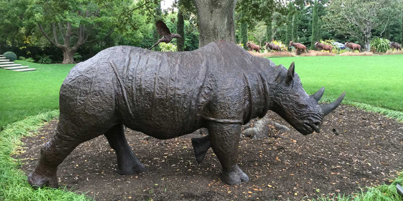 large bronze rhinoceros sculpture (2)