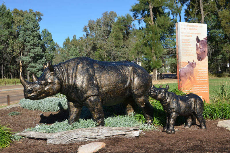 large bronze rhinoceros sculpture (3)