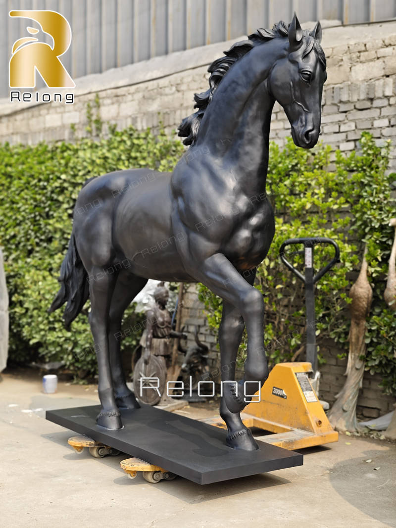 large standing black horse statue