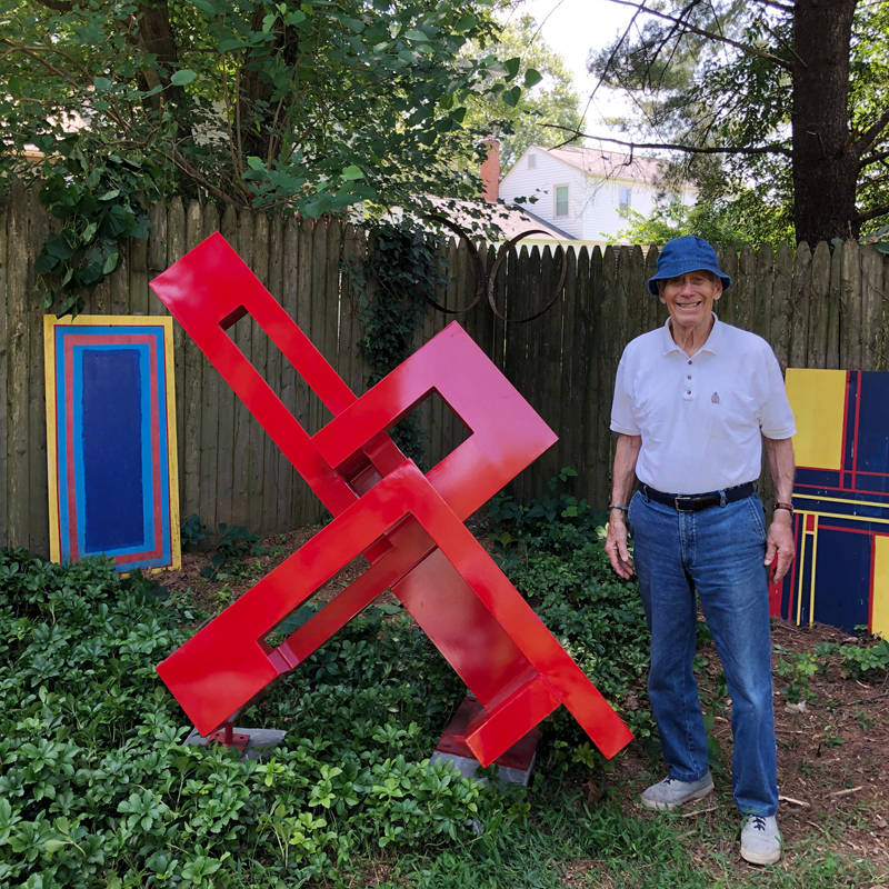 red paint stainless steel abstract sculpture