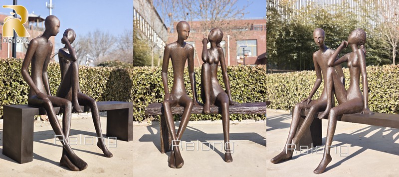 couple on bench sculpture