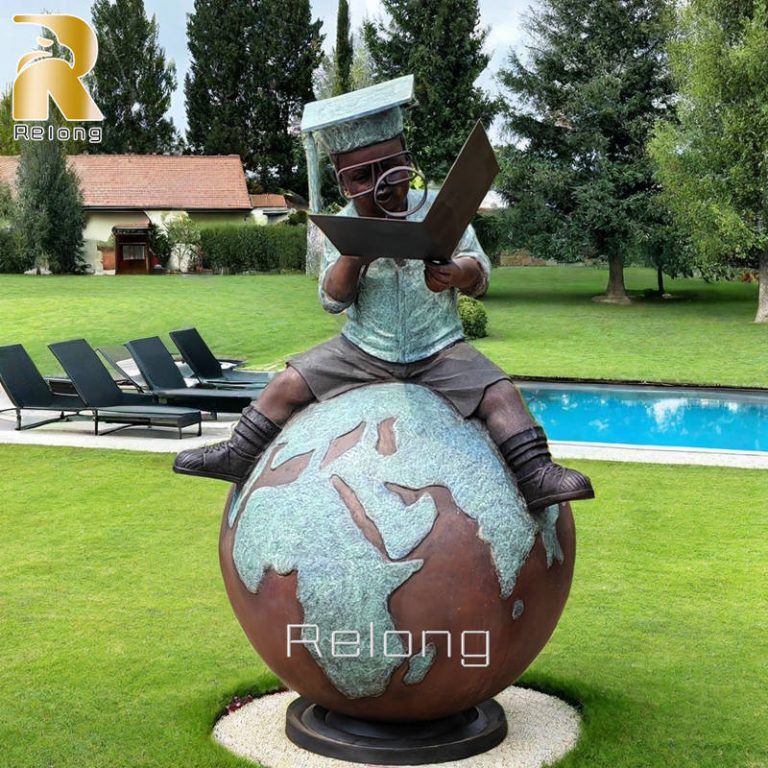 decorative bronze boy reading statue