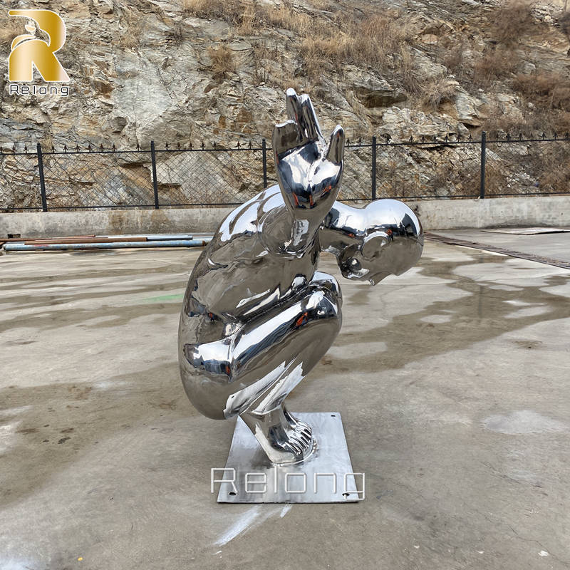 mirror polished metal diving man sculpture