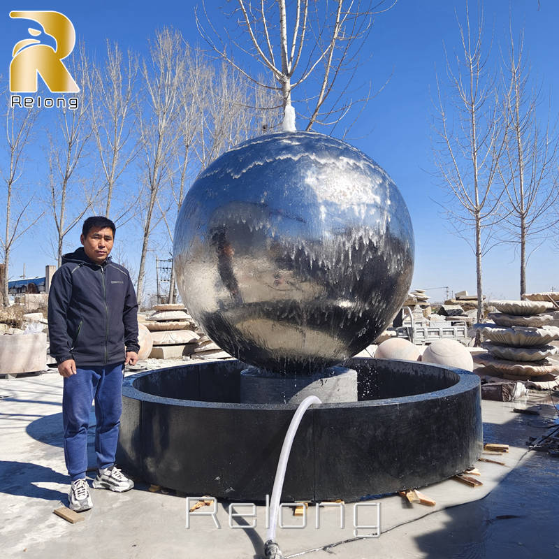 stainless steel ball fountain with marble pool